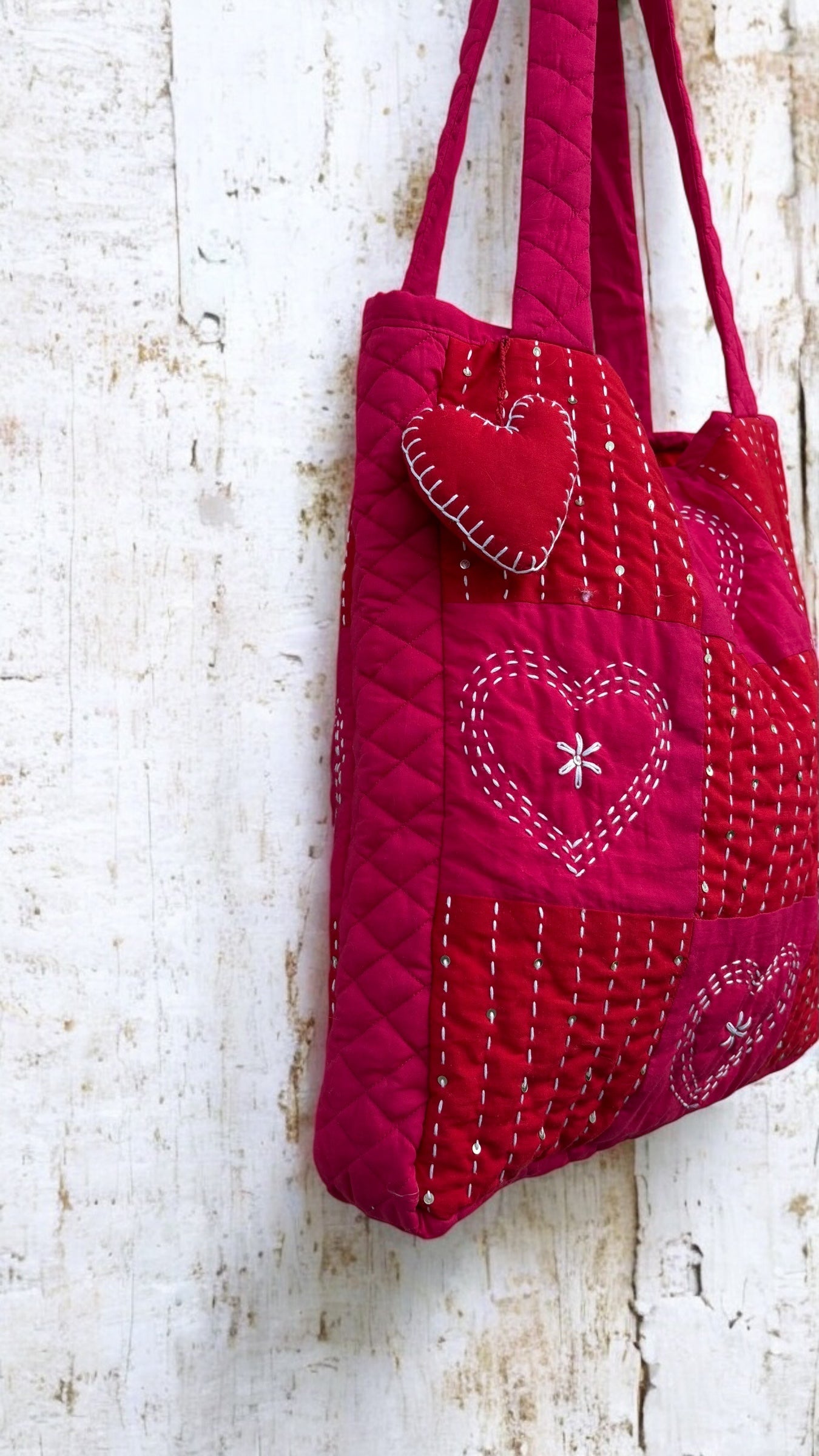 That Romeo handmade red quilted tote bag with heart-stitch Kantha embroidery and charm — made from upcycled fabric, eco-friendly and artisan-crafted