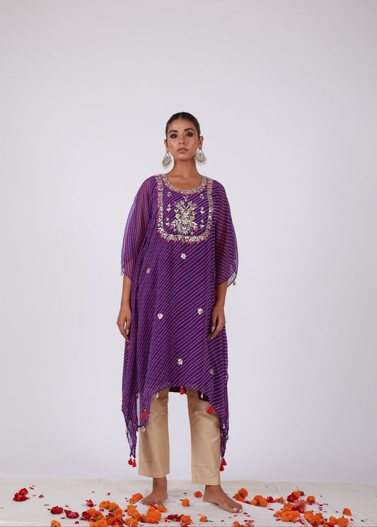 Model wearing the Roobroo purple georgette kaftan with traditional gota patti and zari embroidery, paired with jam silk pants – a festive statement from That Romeo’s Roobroo Collection.