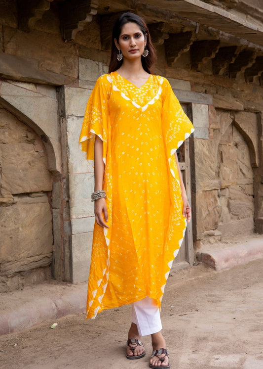 Model wearing the Gule Asharfi chrome yellow semi-silk kaftan with traditional Bandhani work and inner slip – a radiant piece from That Romeo’s Rangisaa Collection.