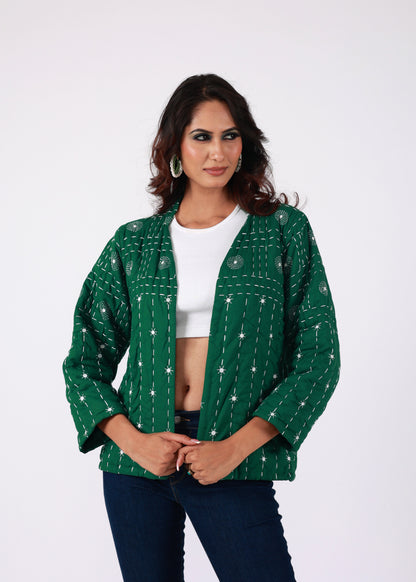Model wearing ThatRomeo’s Emerald Echo Quilted Jacket — emerald green cotton jacket with white thread embroidery and open front.