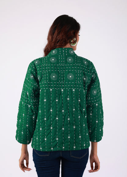 Model wearing ThatRomeo’s Emerald Echo Quilted Jacket — emerald green cotton jacket with white thread embroidery and open front.